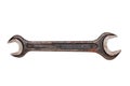 Craftsman tools isolated. Close-up of a old rusty metal wrench or open-end spanner size 19 and 24 for tightening or loosening Royalty Free Stock Photo