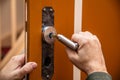 craftsman uninstalling a panel or door mounting, maybe key escutcheon