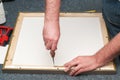 Craftsman working on frame in frameshop. Copy space. Top view Royalty Free Stock Photo