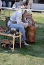 Craftsman works with bark at festival White Night