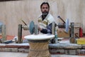 Craftsman works in a workshop making inlaid marble in Agra