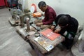 Craftsman works in a workshop making inlaid marble in Agra