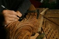 Craftsman& x27;s hands working on wood carving, with gouge and chisel Cabinetmaker, carpentry Royalty Free Stock Photo