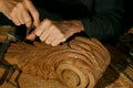 Craftsman& x27;s hands working on wood carving, with gouge and chisel Cabinetmaker, carpentry Royalty Free Stock Photo