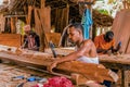 Craftsmen carving wood in Tanzania