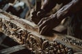 craftsperson carving intricate designs into timber beam