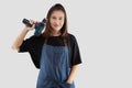 Craftswoman holding a cordless electric drill Royalty Free Stock Photo