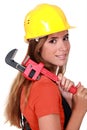 Craftswoman holding a spanner Royalty Free Stock Photo