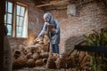 craftswoman in veil holding tablet checking water hyacinth woven crafts