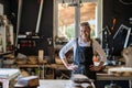 Portrait of confident craftswoman in her workshop Royalty Free Stock Photo