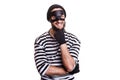 Crafty criminal smiling and thinking Royalty Free Stock Photo