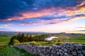 Crag Lough and Hadrian`s Wall at Sunset