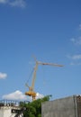 Crain construction building in blue sky. Royalty Free Stock Photo