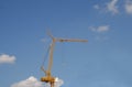 Crain construction building in blue sky. Royalty Free Stock Photo