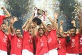 Members of CFR Cluj soccer team celebrate winning the Supercup