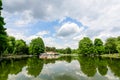 Craiova, Romania, 28 May 2022: Vivid landscape in Nicolae Romaescu park in Dolj county, with lake, waterlillies and large green