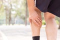 Cramp in leg while exercising. Sports injury concept Royalty Free Stock Photo