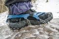 Crampons on black hiking boots Royalty Free Stock Photo
