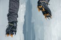 Crampons close-up on his feet ice climber, climber on a frozen w