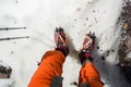 Crampons closeup. . Crampon on winter boot for climbing, glacier walking or extreme hiking ice and hard snow.