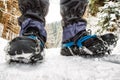 Crampons on hiking boot. Hiking in winter