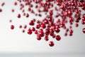 Cranberries falling in mid-air with full depth of field, isolated on a white background for a crisp and clean visual effect Royalty Free Stock Photo