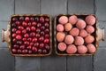 Lychee and cranberry fruit in two square bowls