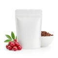 Cranberries and pecans in bowl and pouch, isolated on white background Royalty Free Stock Photo
