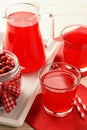 Cranberry drink kissel in glasses on white table. Royalty Free Stock Photo