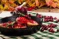 Cranberry glazed chicken with berries