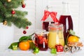 Cranberry juice, honey, mandarins and Christmas tree Royalty Free Stock Photo