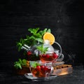 Cranberry and mint tea. Hot winter drinks. Royalty Free Stock Photo
