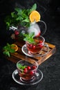 Cranberry and mint tea. Hot winter drinks. Royalty Free Stock Photo