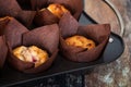 Cranberry orange muffins in brown tulip muffin liners