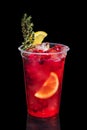 Cranberry vodka cocktail with lemon and rosemary isolated on black Royalty Free Stock Photo