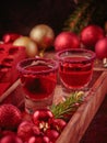 Cranberry vodka shot and Christmas decorations