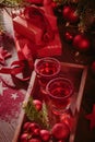 Cranberry vodka shot and Christmas decorations