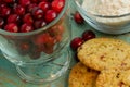 Cranberry White Chocolate Chip Cookies with a side of Cranberries Royalty Free Stock Photo