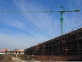 Crane above a new construction residential buildings Royalty Free Stock Photo