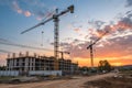 Crane in action during house construction Royalty Free Stock Photo