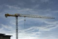 Crane against the backdrop of storm clouds Royalty Free Stock Photo
