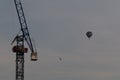 Detail of Crane in the centre of Bristol and hot-air balloon Royalty Free Stock Photo