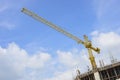 Crane and building construction site against blue sky Royalty Free Stock Photo