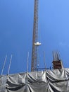 crane and building construction site against blue sky Royalty Free Stock Photo