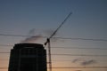 Crane and building construction site against blue sky Royalty Free Stock Photo