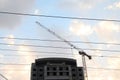 Crane and building construction site against blue sky Royalty Free Stock Photo