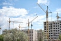 Crane building construction site blue cloudy sky background Royalty Free Stock Photo