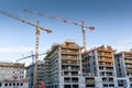 Crane Building New House on the Construction Site Royalty Free Stock Photo