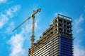 Crane and building site under construction Royalty Free Stock Photo