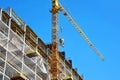 Crane and highrise construction site